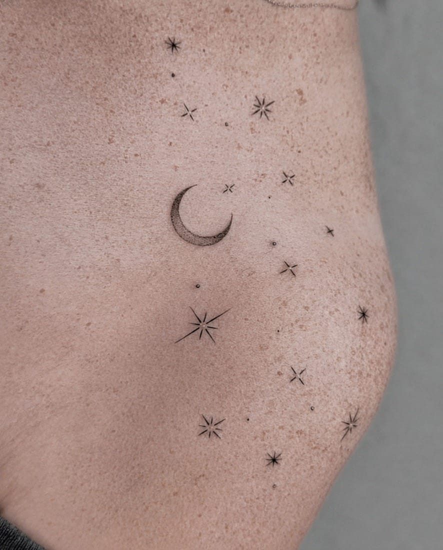 Fine line crescent moon and stars dotwork tattoo by an Essex Fine Line Tattoo Academy student