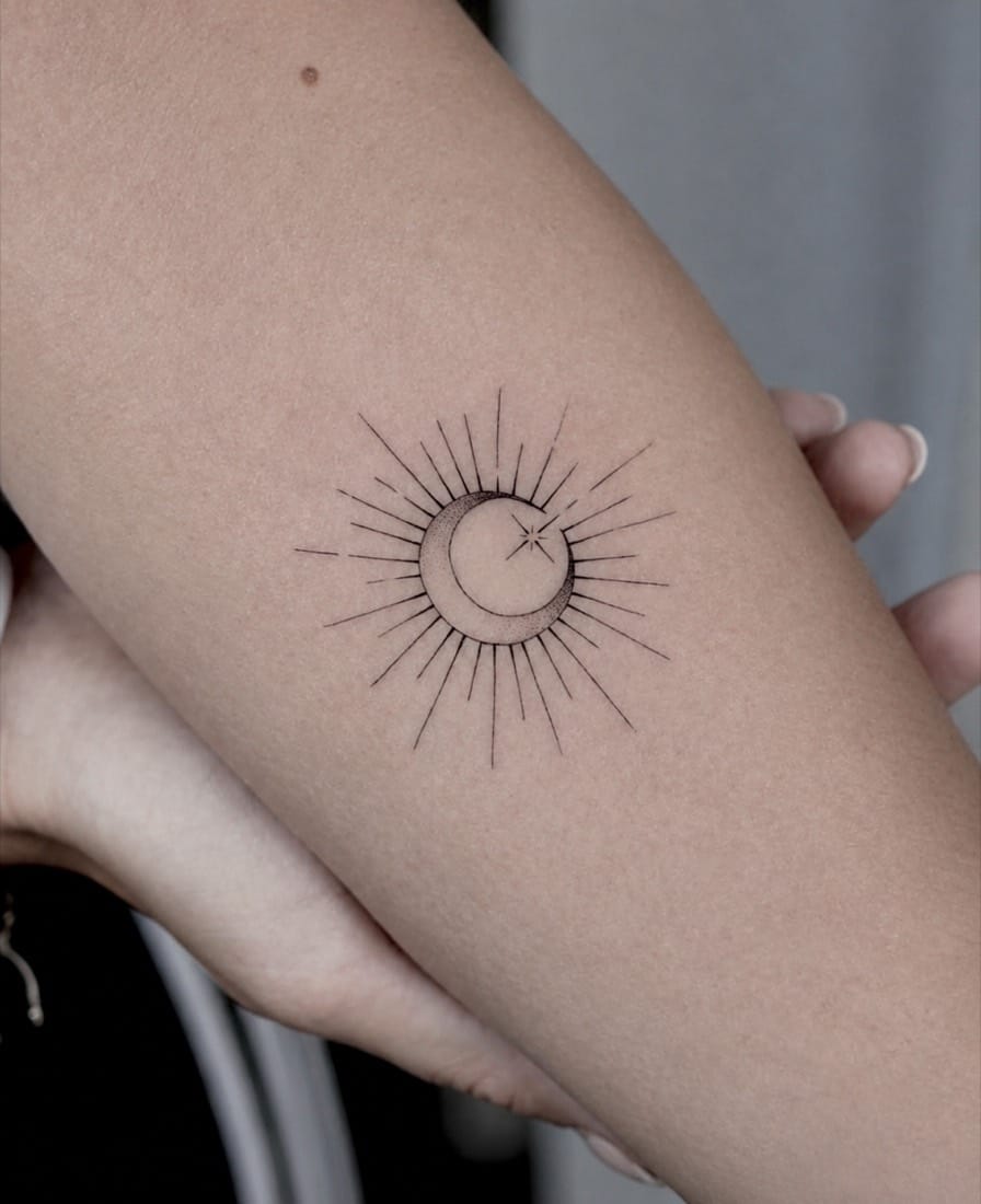 Fine line celestial sun and moon tattoo by a Essex Fine Line Tattoo Academy student